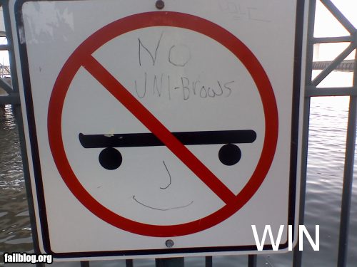 fail-owned-skateboard-unibrow-sign-win.jpg